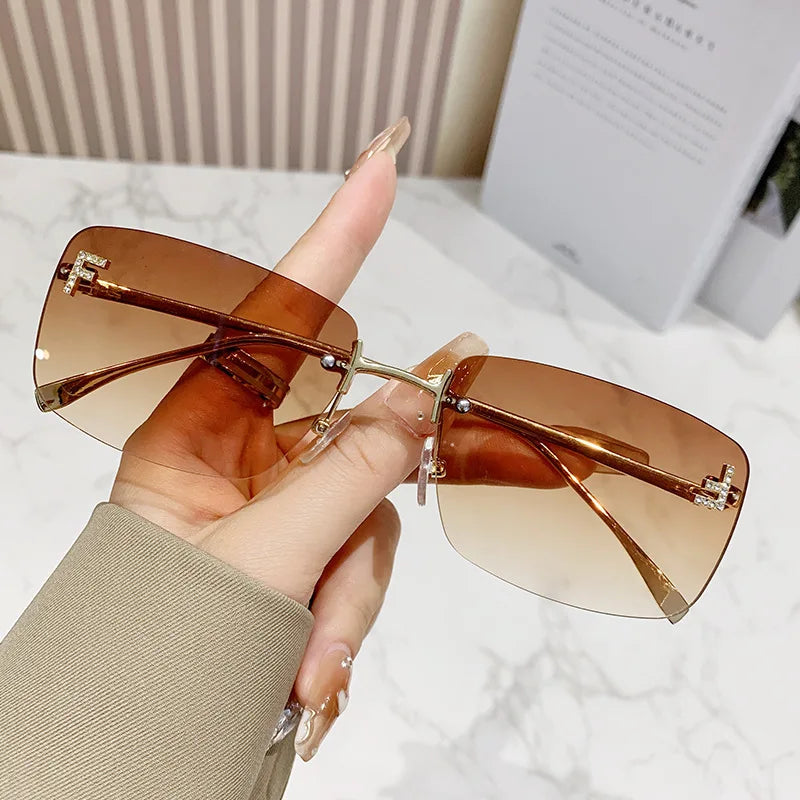 Ruiao rimless sunglasses UV400 fashion square metal glasses for women luxury brand designer diamond y2k small face sun glasses