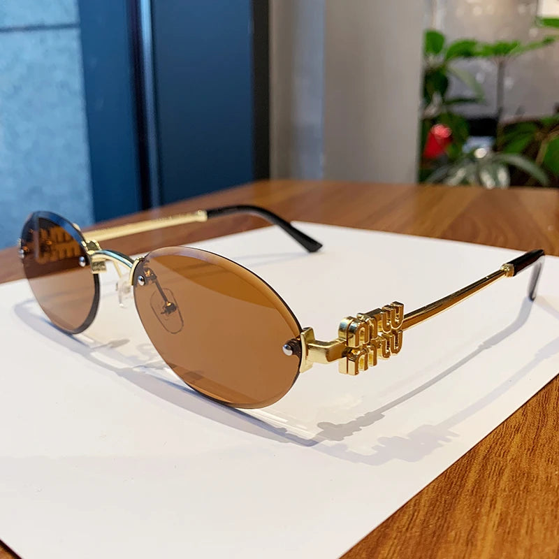 Oval Frame Sunglasses New Rimless Cut Edge Personality Glasses Fashion Design Sense Small Frame Sunglasses 90289