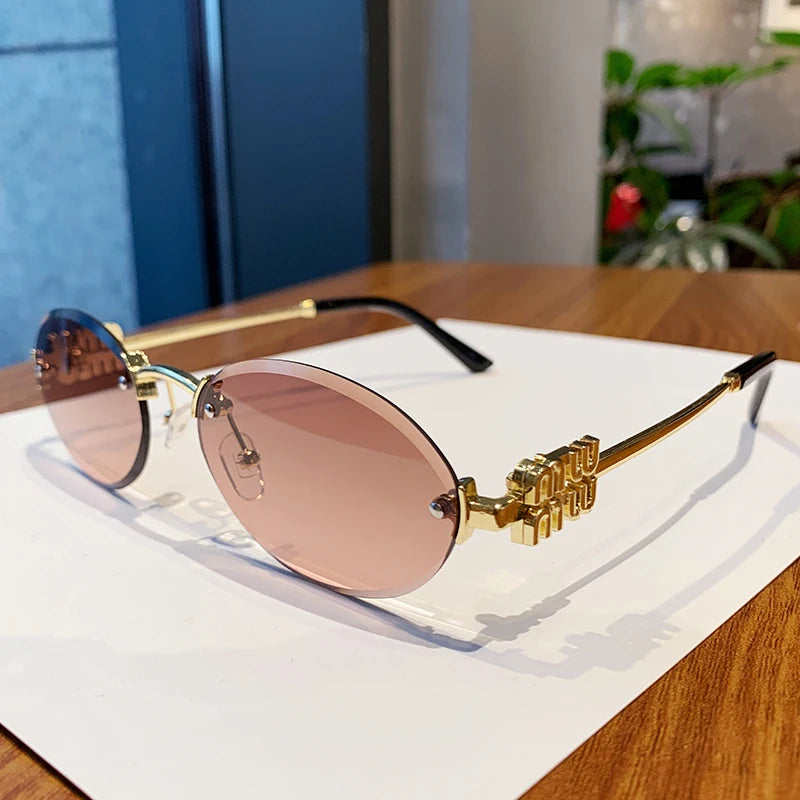 Oval Frame Sunglasses New Rimless Cut Edge Personality Glasses Fashion Design Sense Small Frame Sunglasses 90289