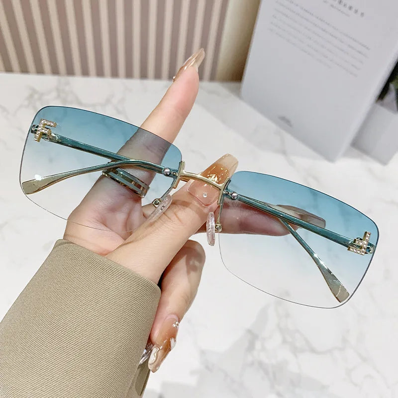 Ruiao rimless sunglasses UV400 fashion square metal glasses for women luxury brand designer diamond y2k small face sun glasses