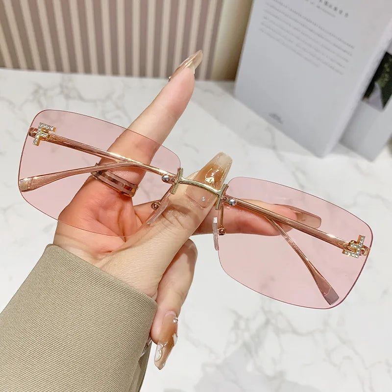 Ruiao rimless sunglasses UV400 fashion square metal glasses for women luxury brand designer diamond y2k small face sun glasses