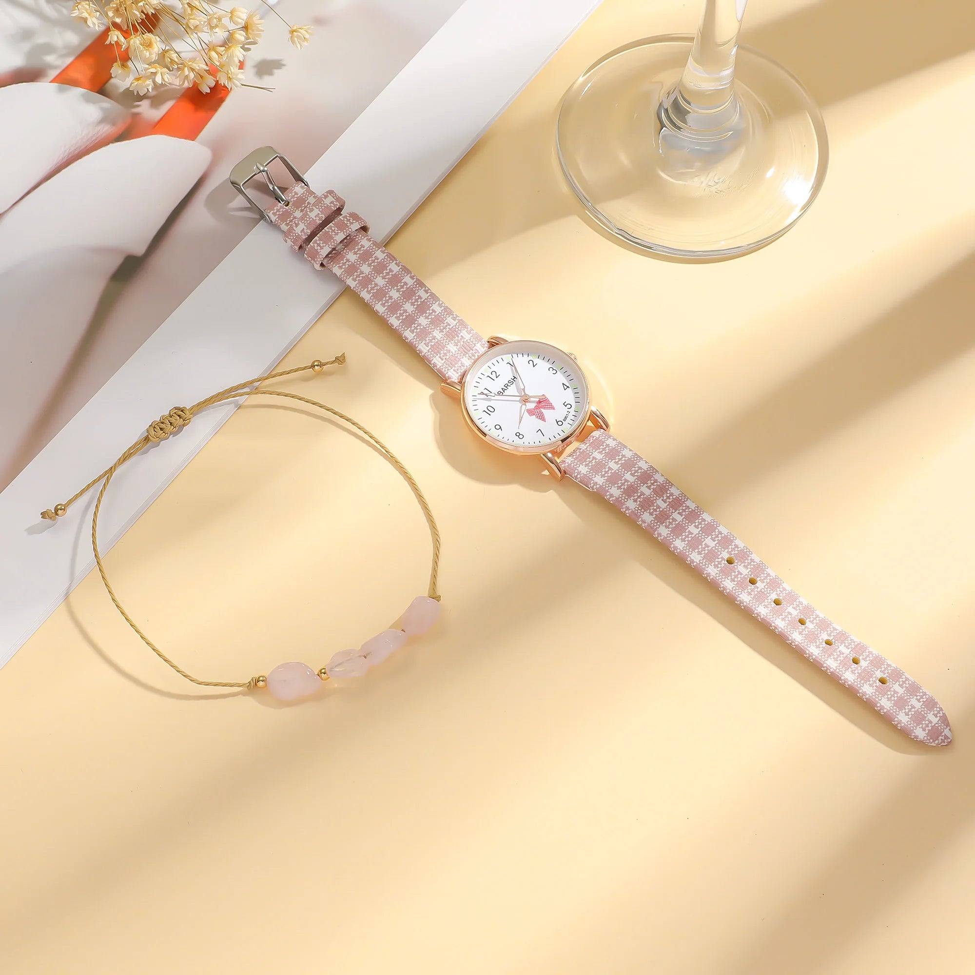 No gift box; cute pink girl's watch and bracelet set; suitable for festivals and birthdays as a gift.