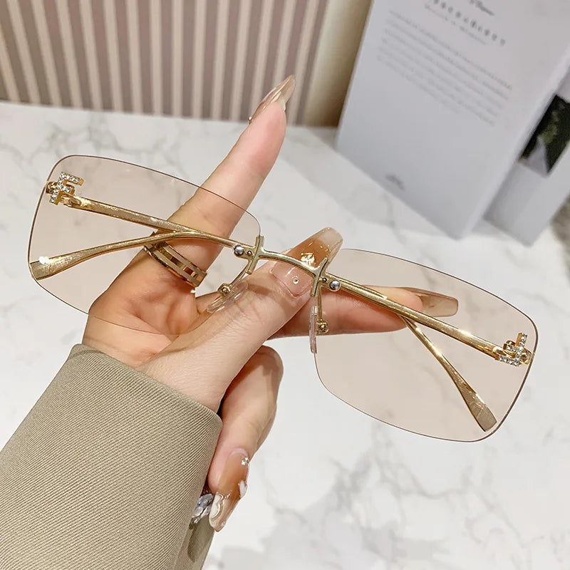 Ruiao rimless sunglasses UV400 fashion square metal glasses for women luxury brand designer diamond y2k small face sun glasses