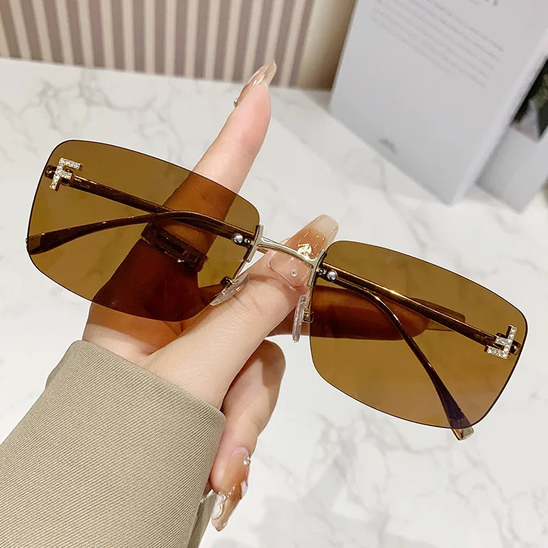 Ruiao rimless sunglasses UV400 fashion square metal glasses for women luxury brand designer diamond y2k small face sun glasses