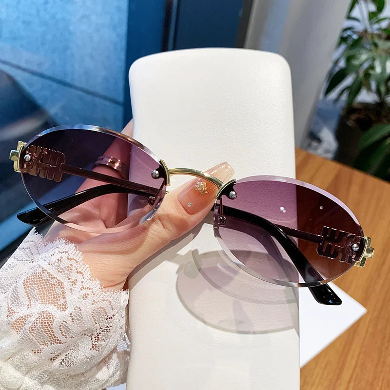 Oval Frame Sunglasses New Rimless Cut Edge Personality Glasses Fashion Design Sense Small Frame Sunglasses 90289