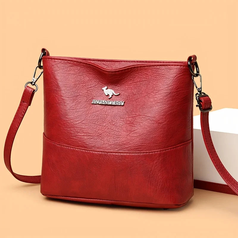 Spacious Chic Crossbody Bag for Women - Soft Faux Leather Shoulder Purse with Adjustable Strap, Zip Closure, Multiple Pockets.